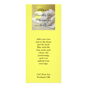 Tarjeta Publicitaria Toallas y vela en un ajuste del balneario