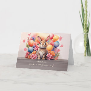 Tarjeta Rabbit de Pascua en medio de flores y globos