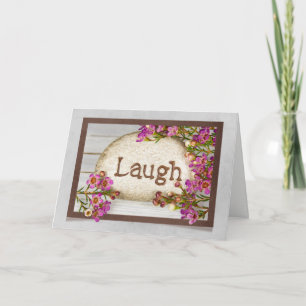 Tarjeta risa de palabra grabada en piedra