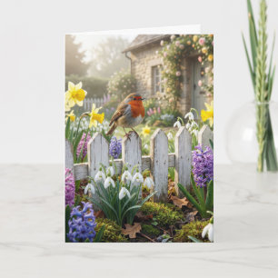 Tarjeta Robin de cumpleaños en una cerca de jardín