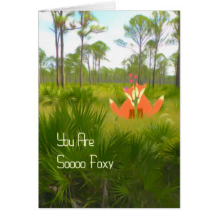 Tarjeta romántica con dos zorros