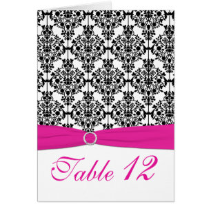 Tarjeta rosada, blanca y negra del número de la