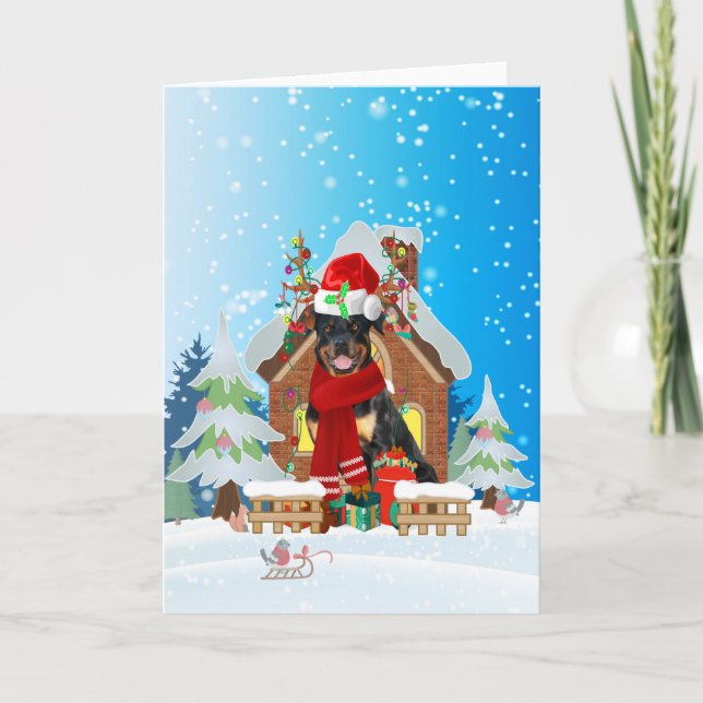 Tarjeta Rottweiler en la nieve con regalos de Navidad  (Anverso)
