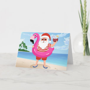 Tarjeta Santa Claus con anillo inflable de flamingo