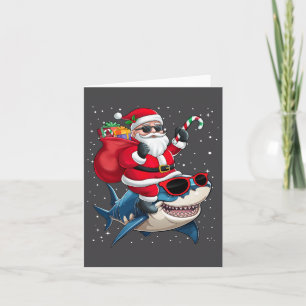 Tarjeta Santa Claus montando un niño Chica de Navidades de