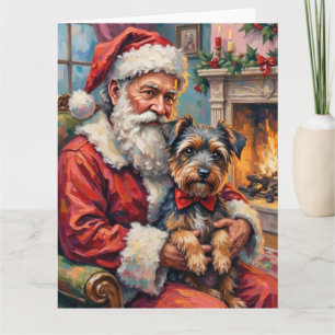 Tarjeta Santa Claus sosteniendo arte de Navidad de Terrier