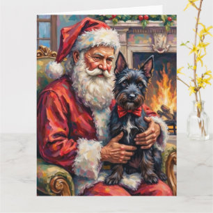 Tarjeta Santa Claus sosteniendo arte navideño de Scottish