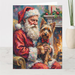 Tarjeta Santa Claus sosteniendo Yorkshire Terrier Navidad