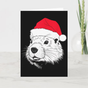 Tarjeta Santa de la marmota alegre en la Navidad de la mar