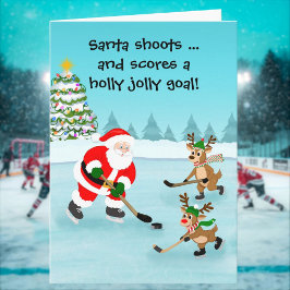 Tarjeta Santa jugando hockey con renos Navidad