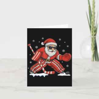 Tarjeta Santa jugando portero de hockey sobre hielo Navida