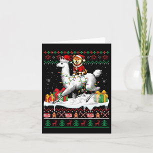 Tarjeta Santa Shiba Inu montando Navidades de Llama Sweate