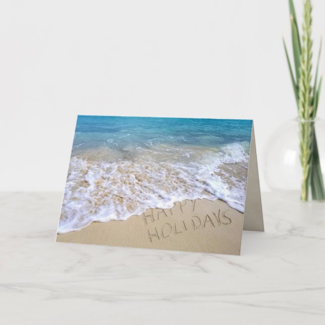 Tarjeta Signo de Felices Fiestas en la playa del océano (Anverso)