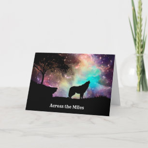 Tarjeta Silhouette Wolf Howling con luces boreales