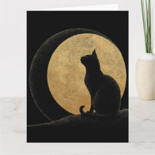 Tarjeta Silueta de gato negro contra una luna dorada