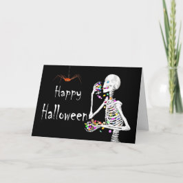 Tarjeta Skeleton comiendo dulces de Halloween (con arañas)
