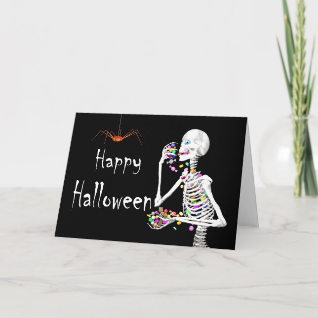 Tarjeta Skeleton comiendo dulces de Halloween (con arañas) (Anverso)