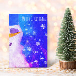 Tarjeta Snowman brilla con Navidades Blue Magic<br><div class="desc">Tarjeta de Navidades mágicos azules con copas de nieve para hombre de nieve. Hermosa tarjeta de Navidades de snowman invernal y copos de nieve. Feliz deseo de Navidad para tus amigos y familia - puedes cambiar el texto. Copos de nieve blancos sobre fondo abstracto azul y rosa.</div>