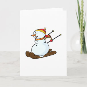 Tarjeta Snowman como esquiador con esquís y gorra