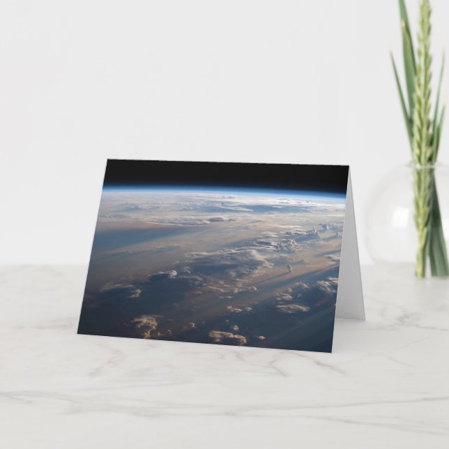 Tarjeta Sunrise arroja largas sombras sobre el mar de Fili (Anverso)