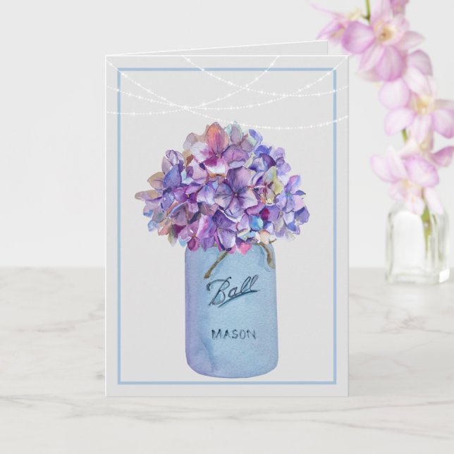 Tarjeta Tarro de Mason con Hydrangeas Moradas Luces de Cue (Orquídea)