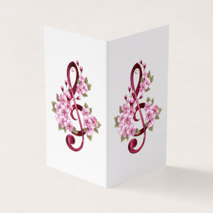 Tarjeta Tejidos musicales notas de colores con flores de S