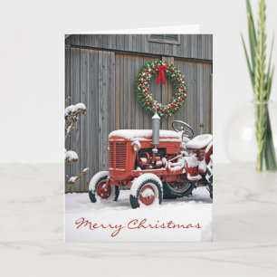 Tarjeta Tractor agrícola rojo de Navidad en la nieve