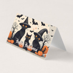 Tarjeta Tres gatos negros con sombreros en Halloween