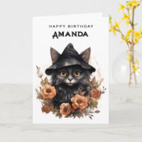 Un gato negro lindo en el cumpleaños Gorra de una