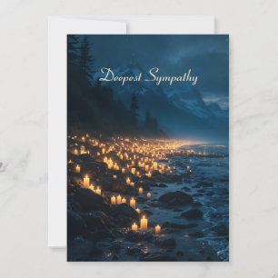 Tarjeta Un mar de luces de velas en la playa en la oscurid