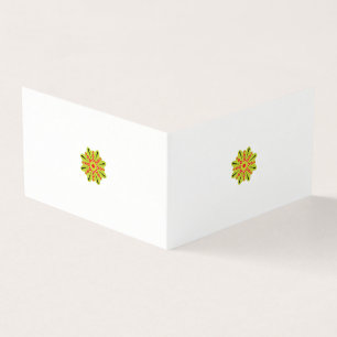 Tarjeta una flor verde y roja con puntos negros