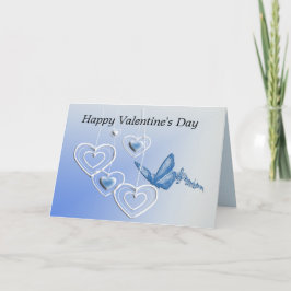 Tarjeta Una mariposa y corazones