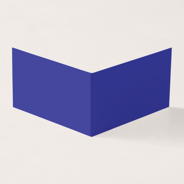 Tarjeta una pared azul con un reloj en ella (Exterior)