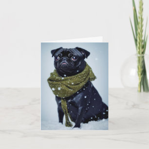Tarjeta Una tierna cachorro en una bufanda verde de invier