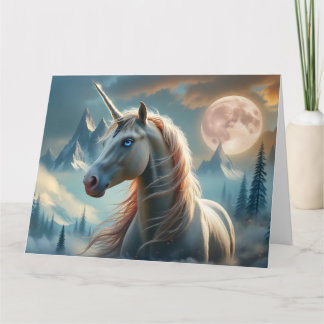 Tarjeta Unicornio místico en montañas encantadas