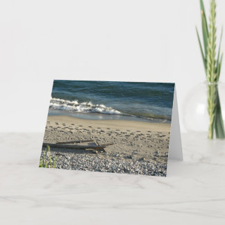 Tarjeta unos escalones en la arena