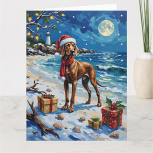 Tarjeta Vacaciones de Navidad en la playa con Weimaraner