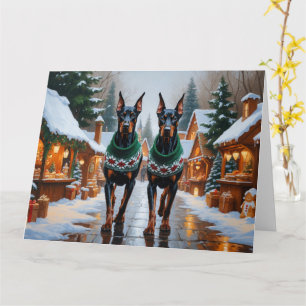 Tarjeta Vacaciones de nieve para Navidades de perros Dober