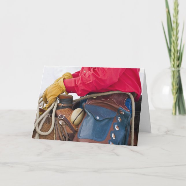 Tarjeta Vaquero en grietas del cuero del caballo que (Anverso)