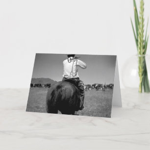 Tarjeta Vaquero en un caballo con dos marcas