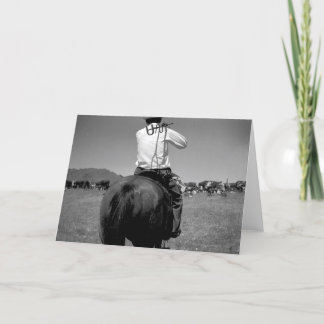 Tarjeta Vaquero en un caballo con dos marcas