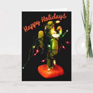 Tarjeta Vela de cactus envuelta en luces de Navidad