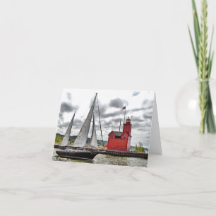 Tarjeta velero con faro rojo