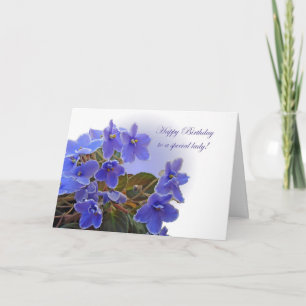 Tarjeta Violetas africanas azules del cumpleaños