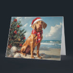 Tarjeta Vizsla Dog Navidades Vintage Beach<br><div class="desc">Traiga el calor de las vacaciones a la orilla con este encantador diseño de estilo vintage con un perro de festividad sentado en una tranquila playa. Con un toque vacacional clásico de tonos nostálgicos y vibraciones costeras, esta obra de arte capta la magia de los Navidades junto al mar. Perfecto...</div>
