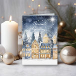 Tarjeta Watercolor Vintage Village Star Navidades nocturno<br><div class="desc">Tarjeta de Navidades nocturnos Watercolor Vintage Village Star. Esta hermosa tarjeta de pueblo de medianoche ofrece un impresionante cielo nocturno sobre un pueblo vintage, con su saludo elegantemente mostrado en la parte delantera. Su muñeco de nieve del pueblo natal, medianoche, tonos estrellados y tranquilos detalles inspirados en el pueblo le...</div>