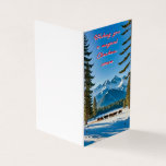 Tarjeta Whimsical Winter Wonderland<br><div class="desc">La imagen del impresionante paisaje invernal con montañas cubiertas de nieve,  árboles verdes y vacas de pastoreo enmarcadas por un cielo despejado</div>