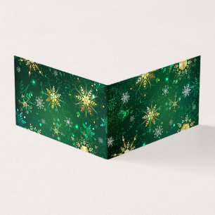 Tarjeta Xmas copos de nieve dorados sobre fondo verde