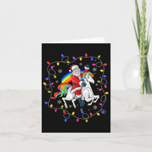 Tarjeta Xmas iluminando a Santa Claus viajando a Unicornio
