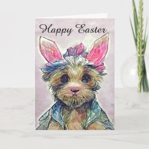 Tarjeta Yorkie feliz de Pascua con orejas de conejo